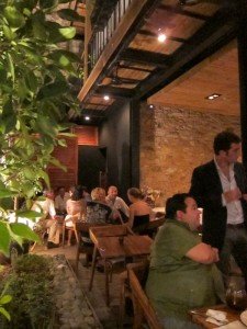 Patrons enjoy drinks while waiting for entrees at Casco Viejo's newestrestaurant L'Osteria
